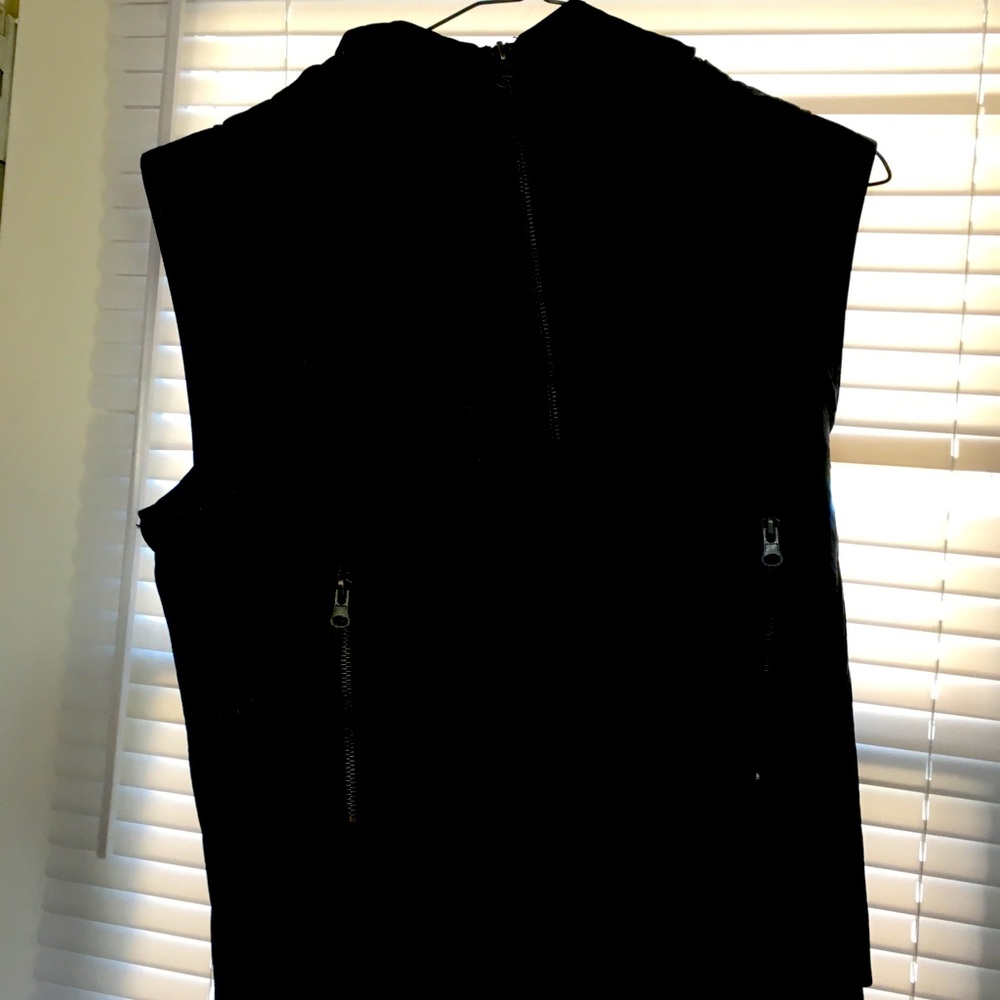 Real leather vest with hood.
